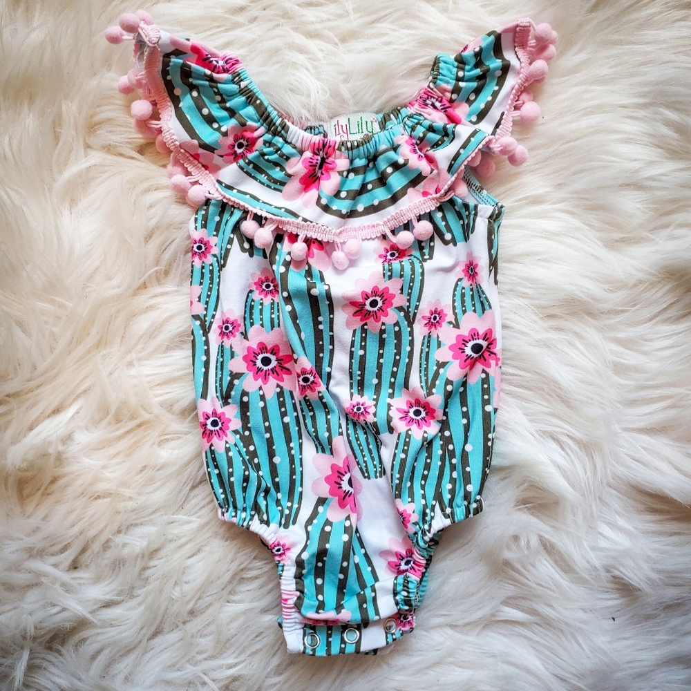 Infant pompom onesie